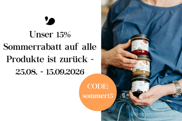 marmeladengläser-gestapelt-in-der-hand-gehalten